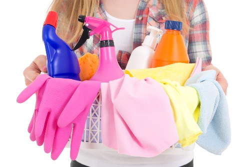 Carpet cleaning staff member wearing PPE during service