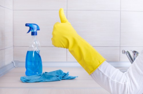 Cleaner managing hoses and equipment to reduce trip hazards